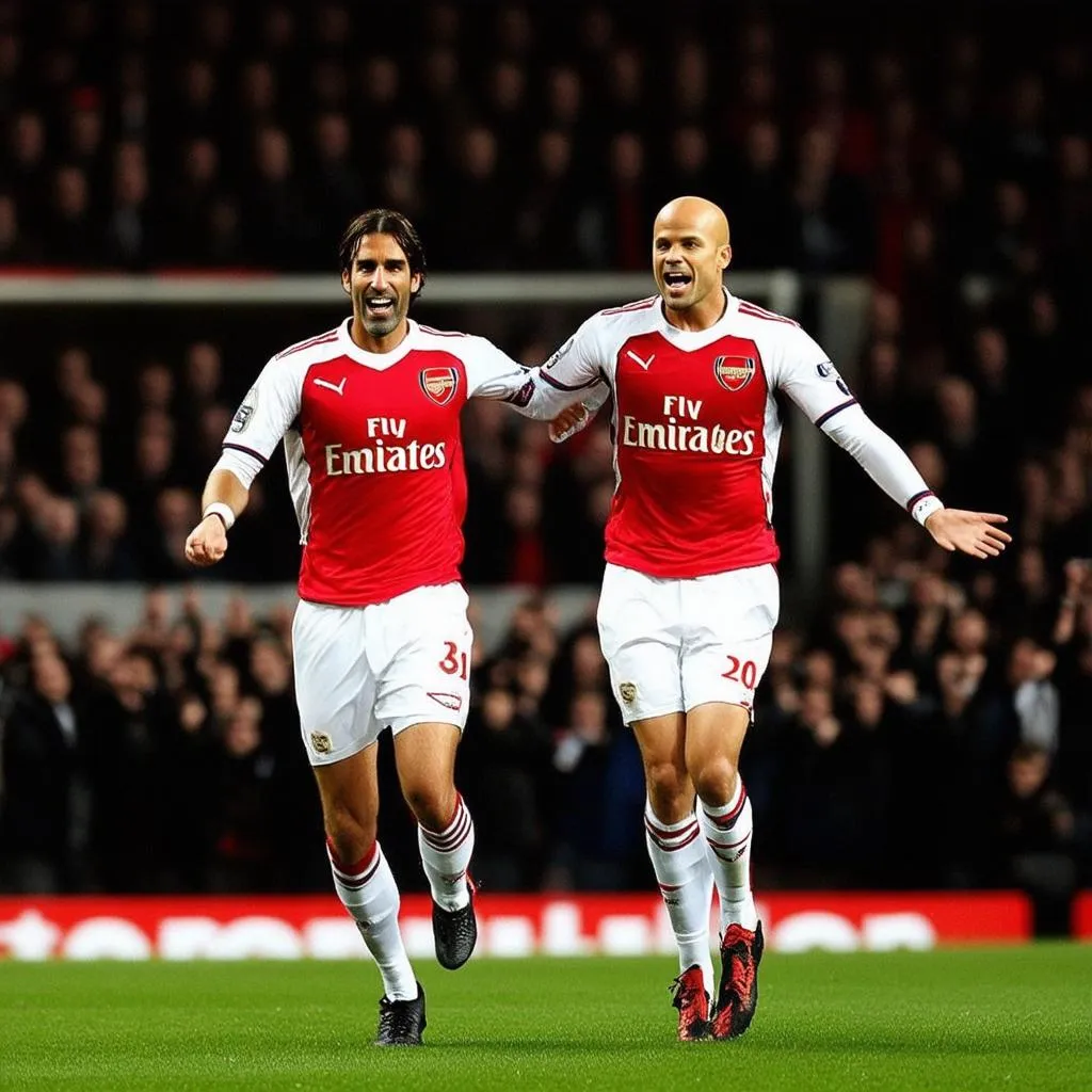 robert-pires-freddie-ljungberg-tien-ve-canh-arsenal