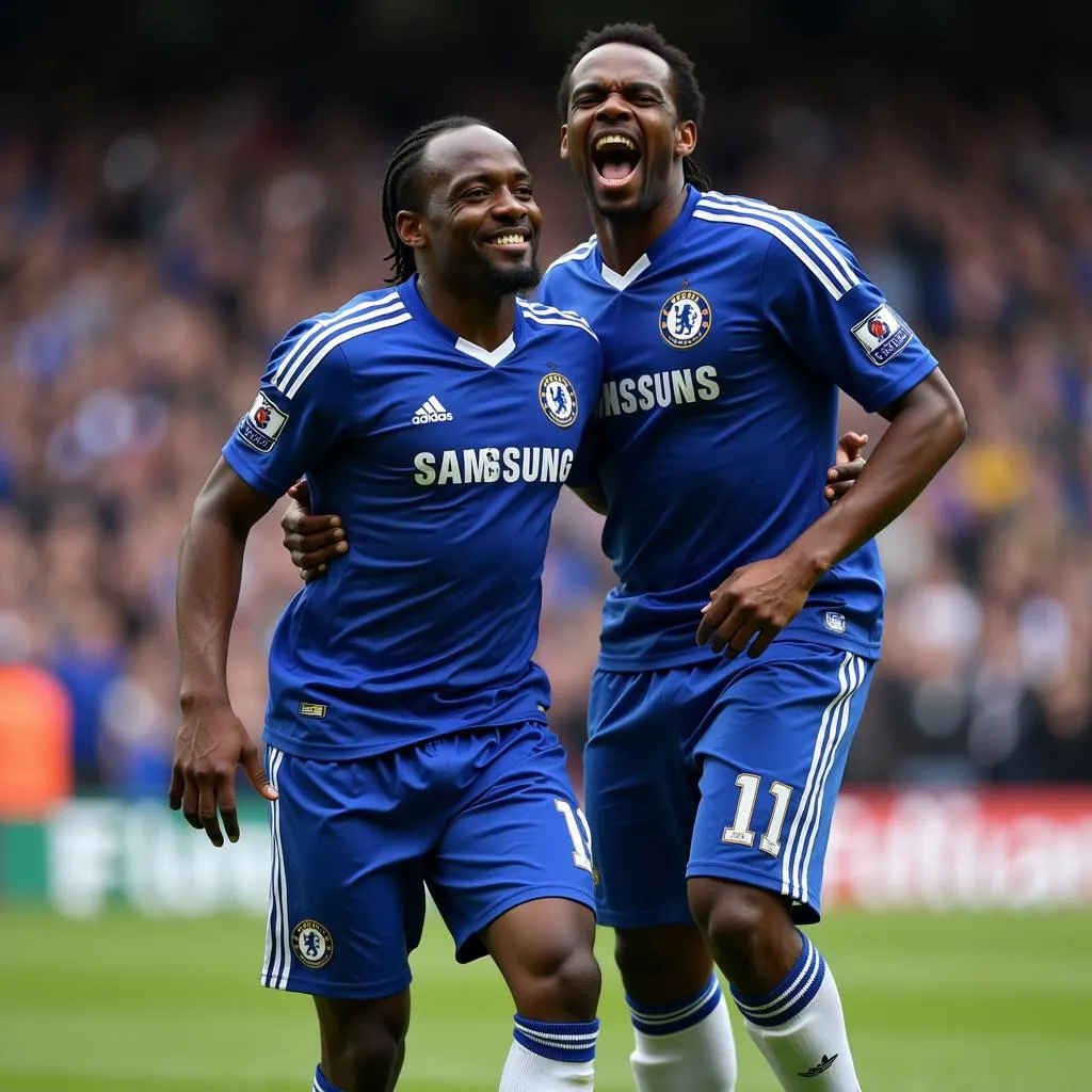 Drogba ăn mừng bàn thắng cùng Lampard